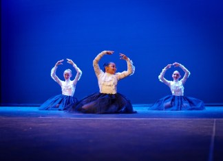 LITTLE DANCING FEET: PRODIGY DANCE CENTER PRESENTS SPRING RECITAL a group of people that are on a stage