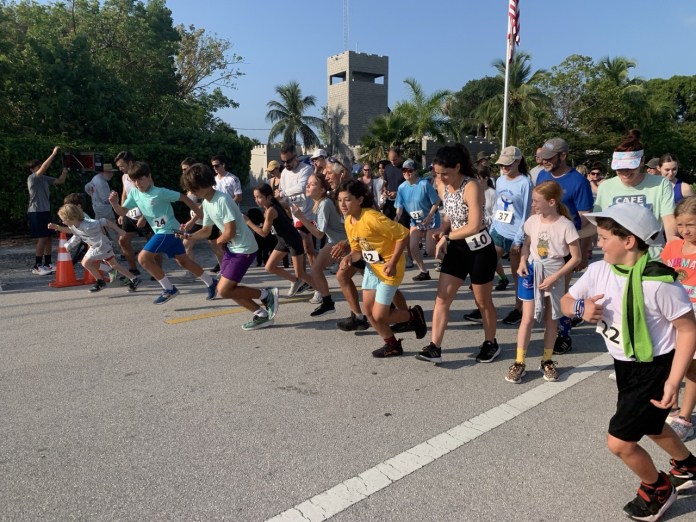 Pascal_s Way 5k Large a group of children are running in a race