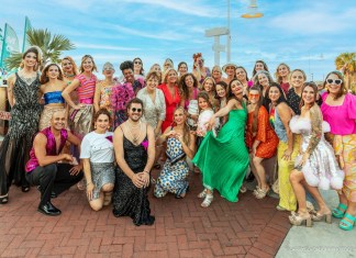 KEY WEST STEPS OUT IN STYLE FOR OUT OF THE CLOSET FASHION SHOW a group of people posing for a picture