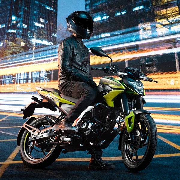 Side profile of the Bajaj Pulsar N125 showcasing its sporty fuel tank and aerodynamic design