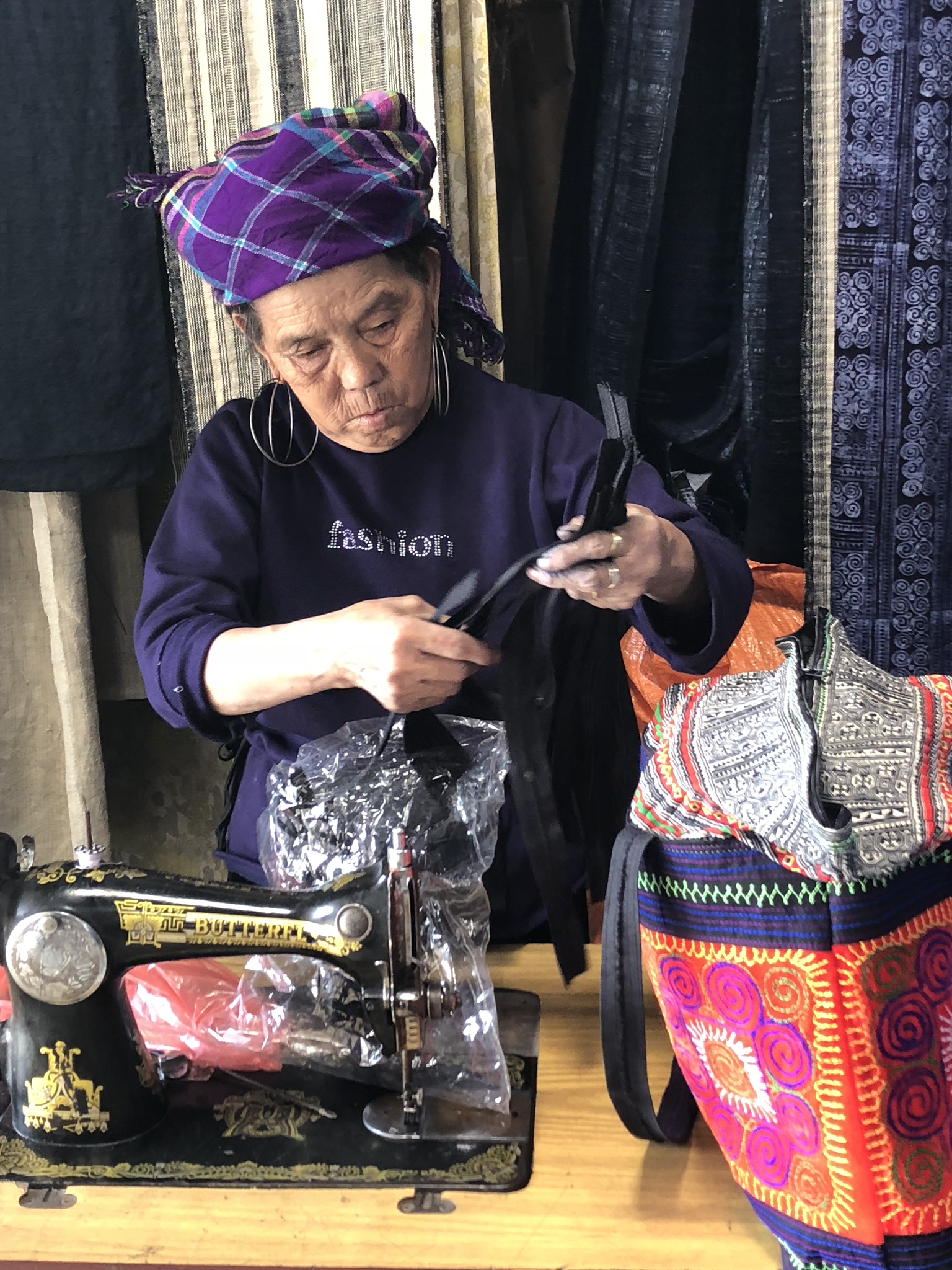 Local lady fixing our bag :)