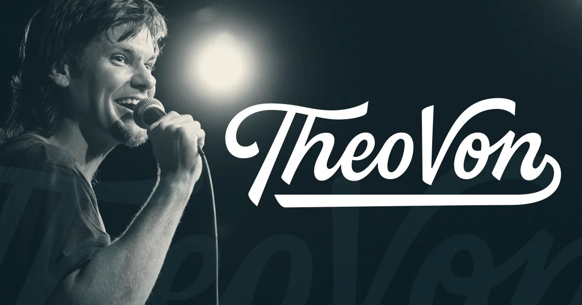 Theo Von Standing with mic inhand