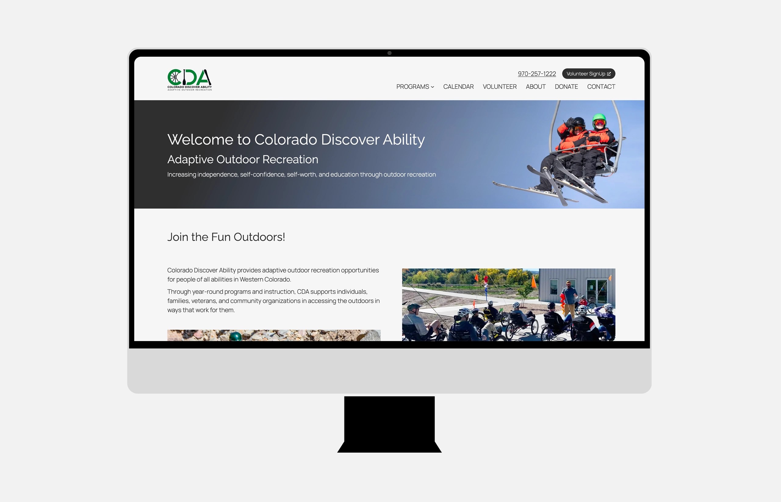 Desktop computer showing the website of Colorado Discover Ability.