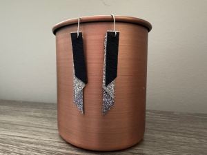 Tiered black and silver earrings.