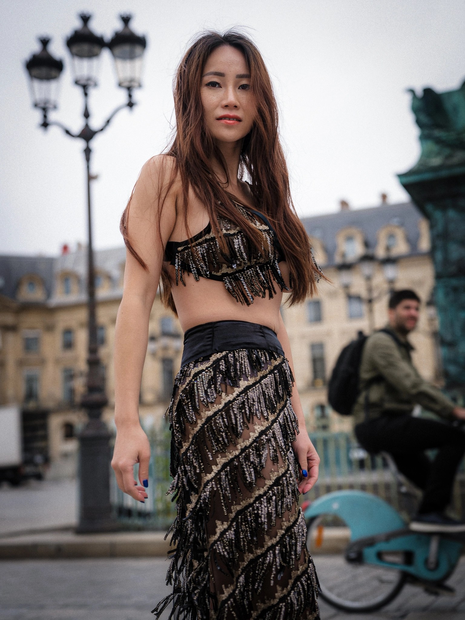 Close street portrait of Lily Stadil in a beaded BRAXTON look at Place Vendôme
