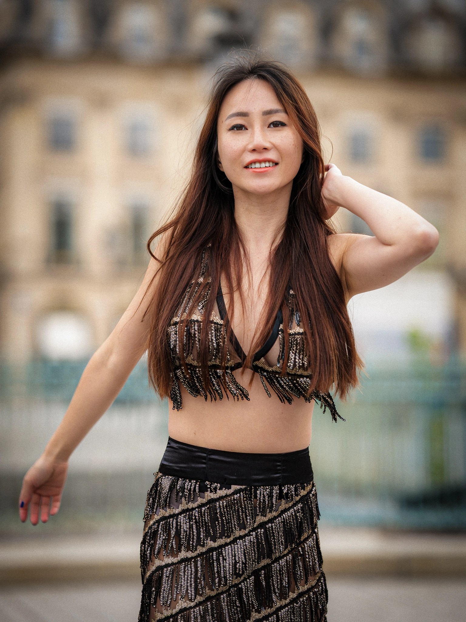 Smiling close portrait of Lily Stadil at Place Vendôme