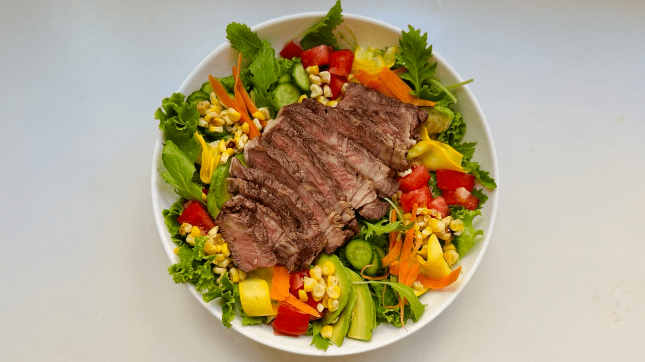 assenble steak salad with koji onion dressing
