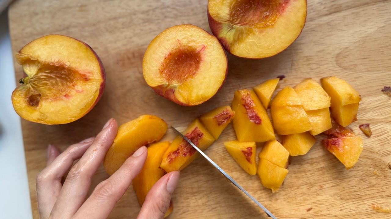 cutting peach for peach ice pop