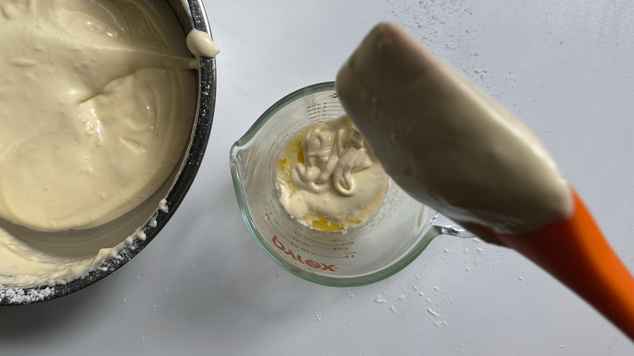 take some batter into butter mixture for sponge cake