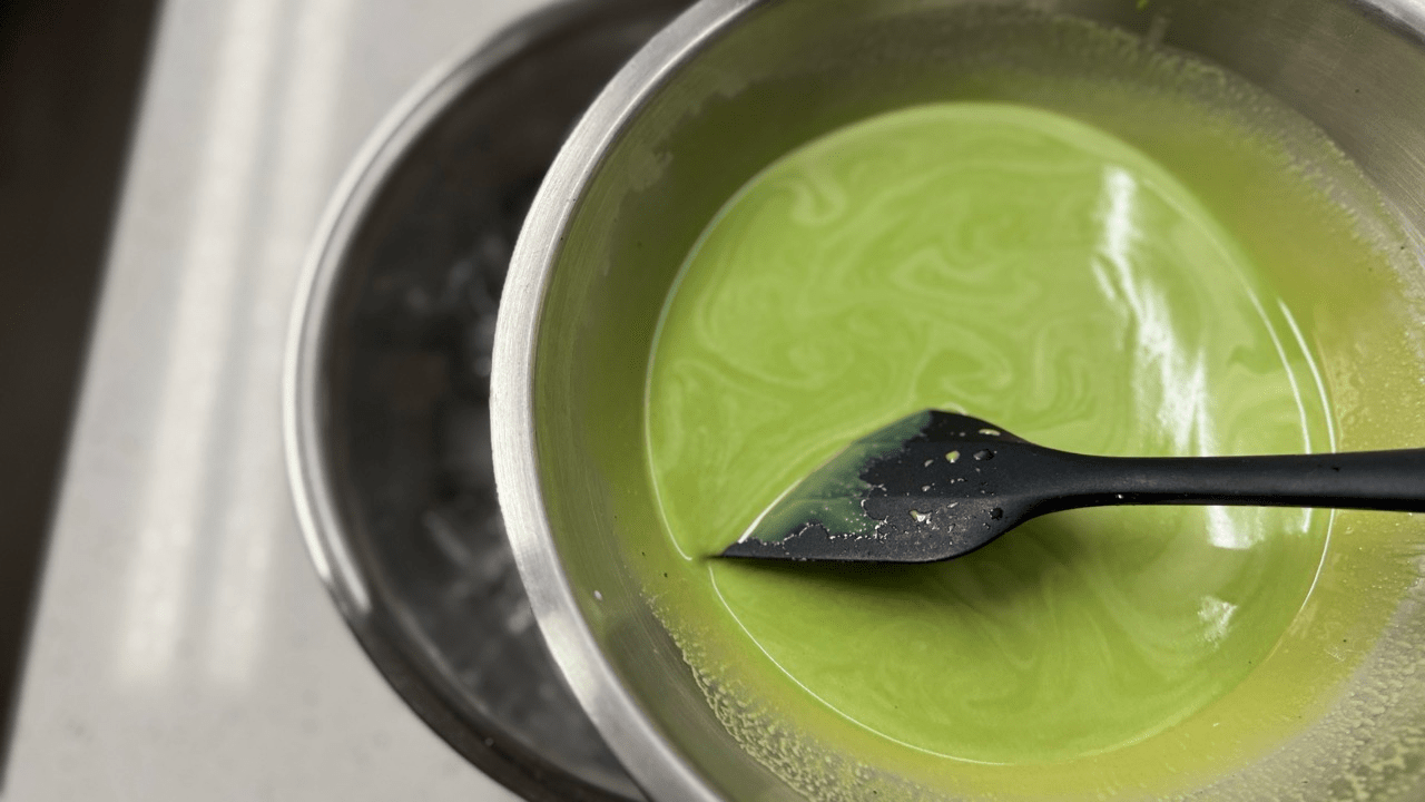 cool down matcha panna cotta base in the ice bath
