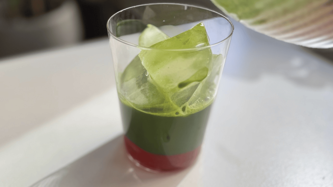 pouring the koi matcha into the glass to making Strawberry cloud matcha latte