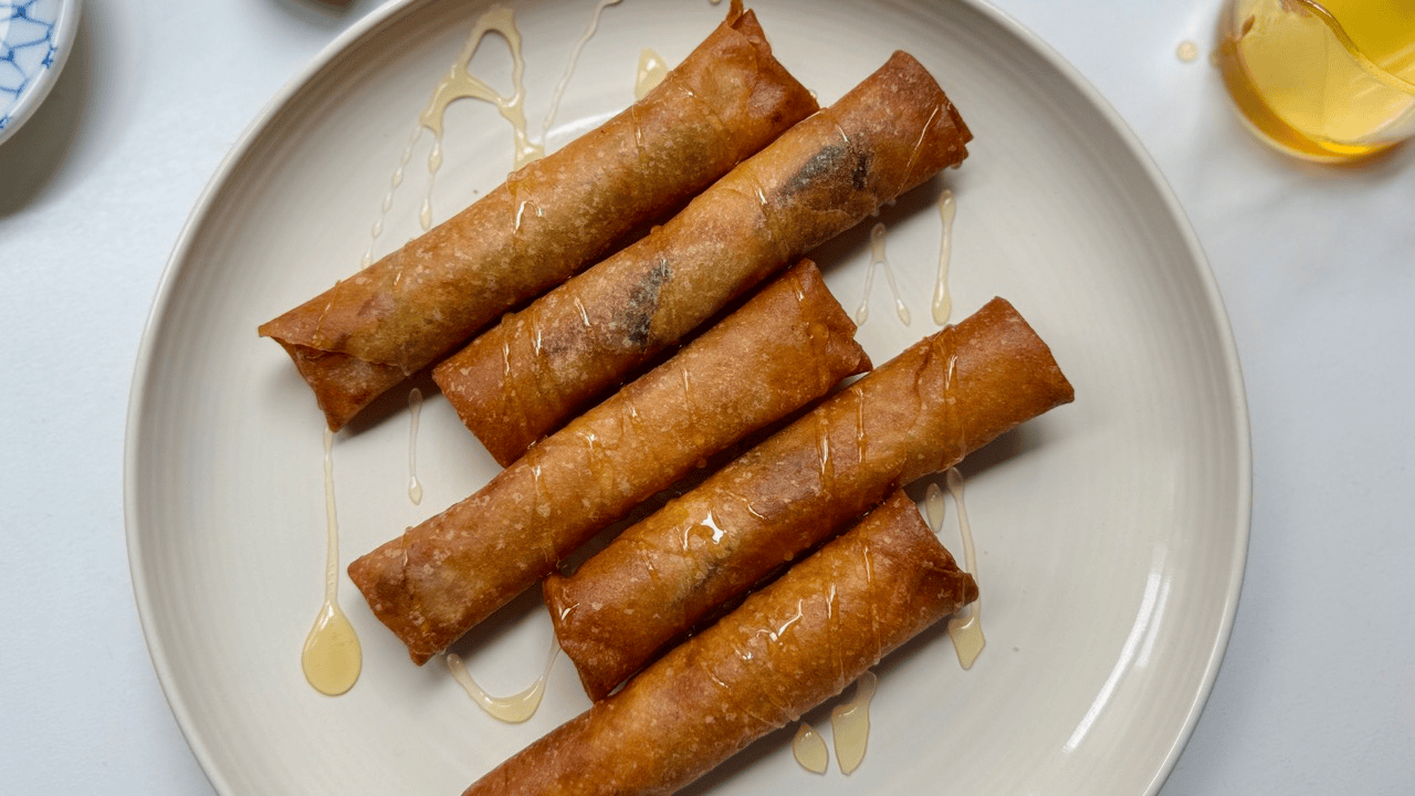drizzling honey for fig spring roll