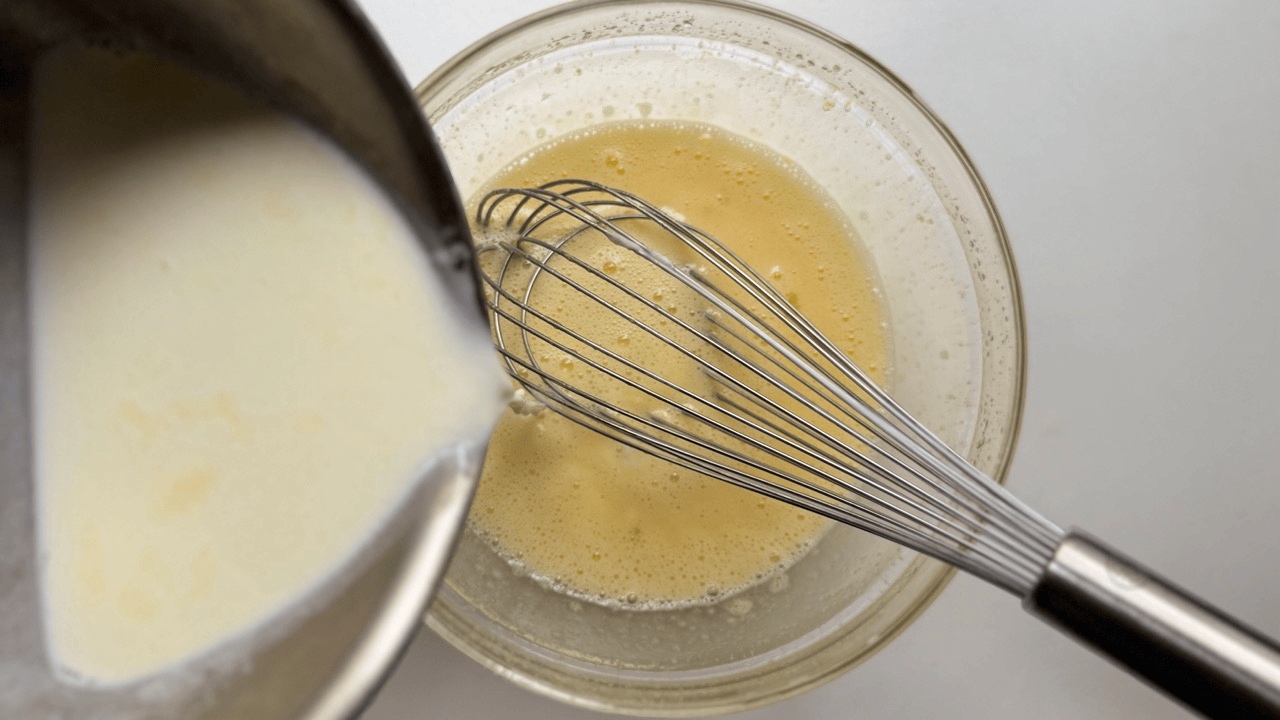 slowly pour the milk into the kabocha flan base
