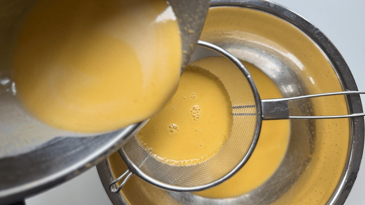 strain the kabocha flan base with fine mesh