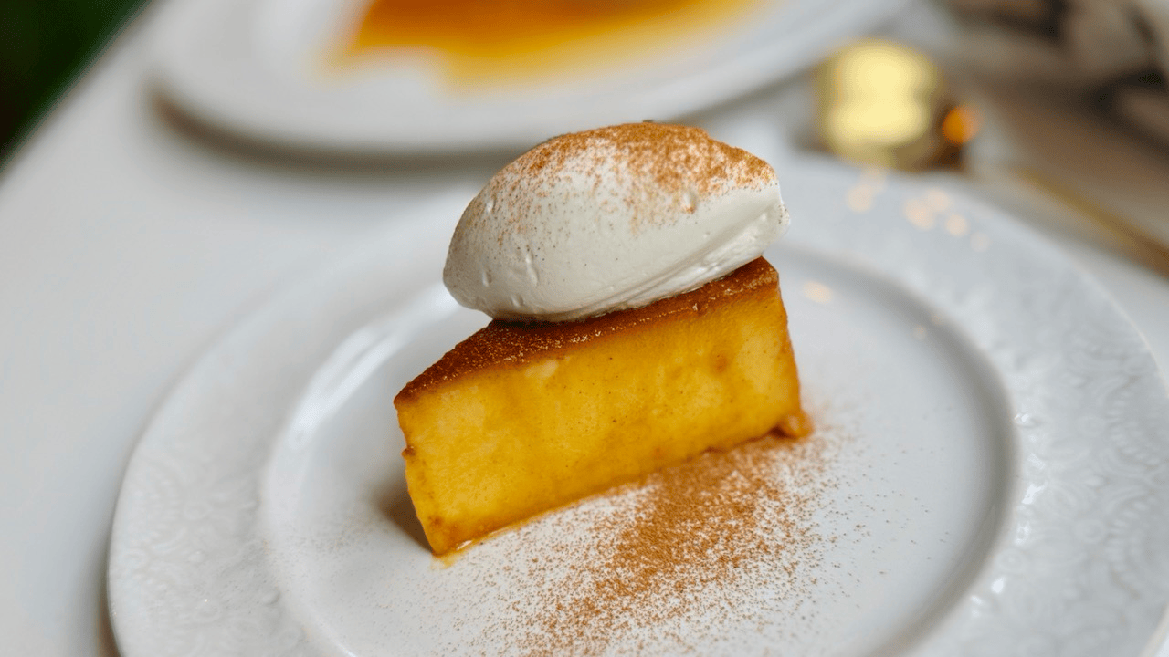 kabocha flan with served with the whipped cream with cinnamon
