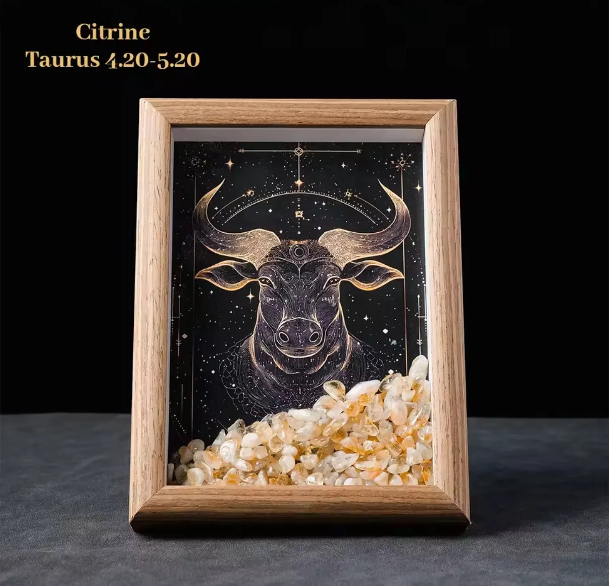 The Zodiac Crystal Frame – Astrology Wall Art with Healing Crystals features a bull for Taurus (4.20–5.20) with golden horns and stars, set behind citrine stones—an ideal decor piece for astrology lovers.