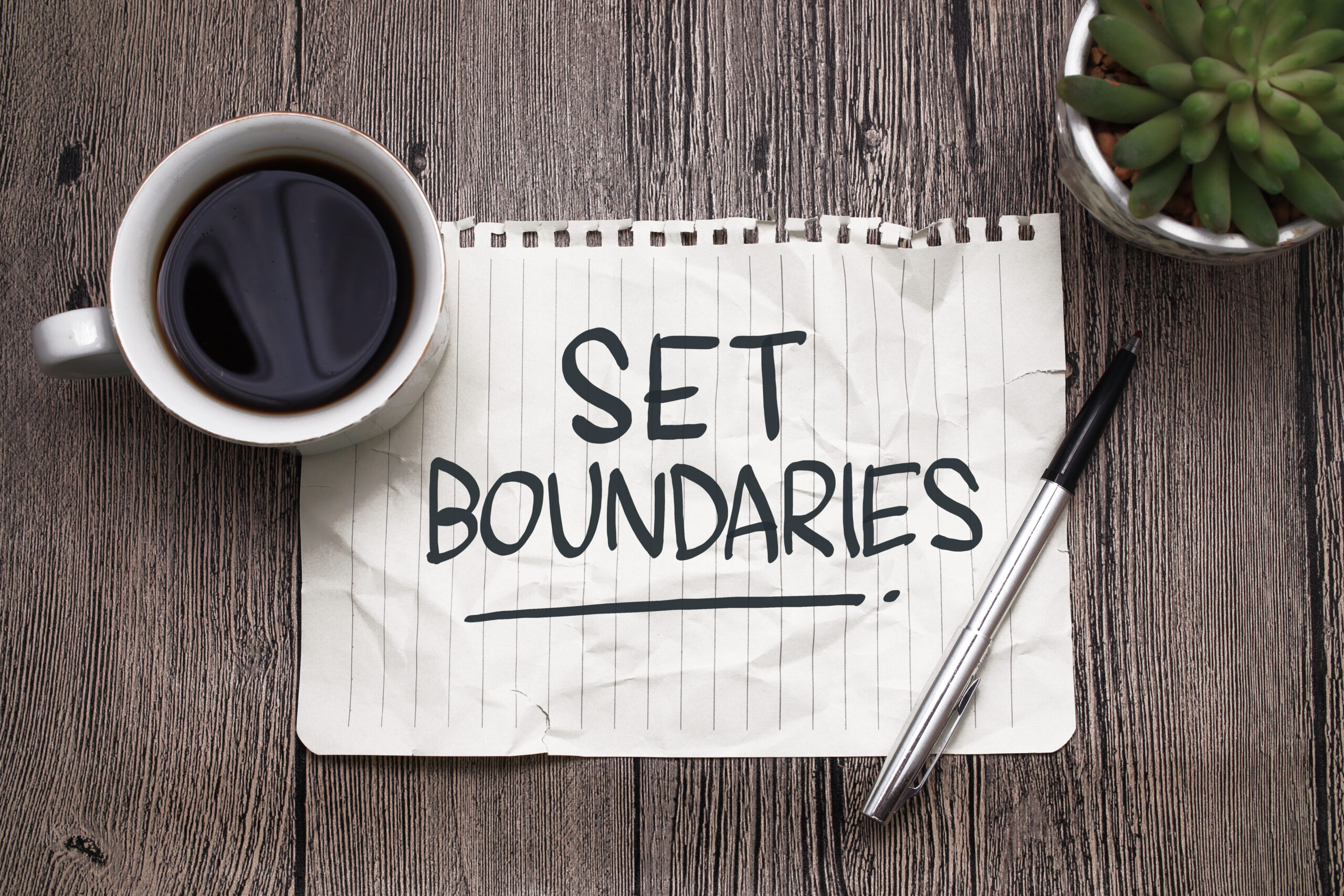 Set,Boundaries,,Text,Words,Typography,Written,On,Paper,Against,Wooden