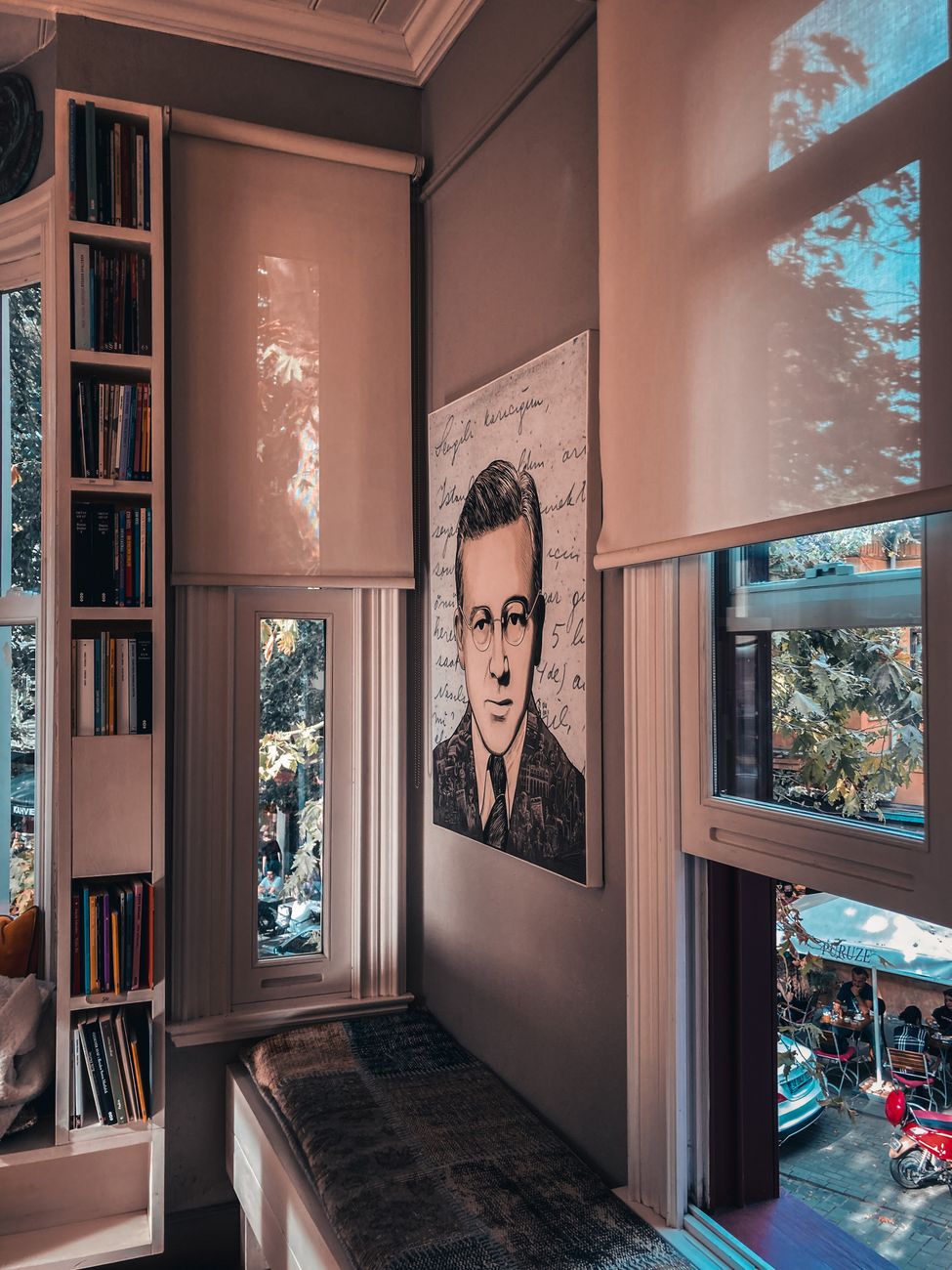 portrait painting hanging on the wall