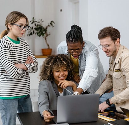 Team of digital marketers collaborating on data-driven strategies at a leading PPC agency
