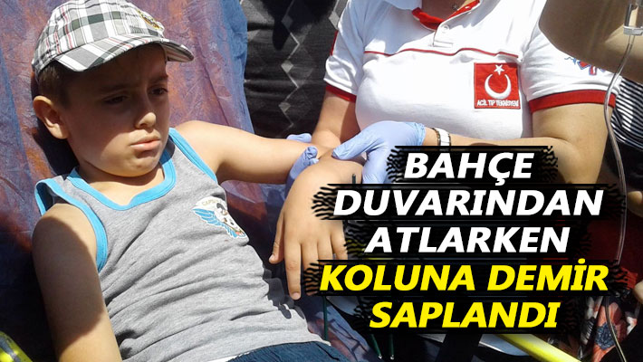 Bahçe duvarından atlarken koluna demir saplandı