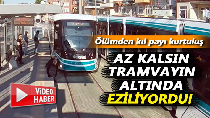 Az kalsın tramvayın altında eziliyordu!