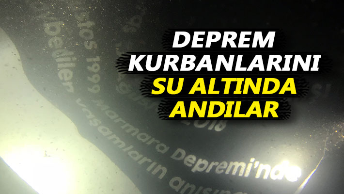 Deprem kurbanlarını su altında andılar