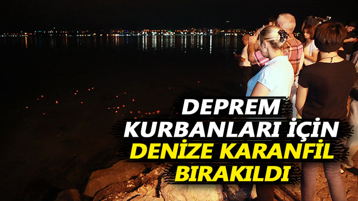 Deprem kurbanları için denize karanfil bırakıldı