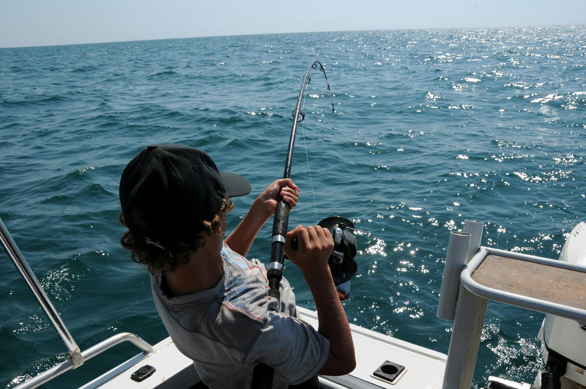photo of man fishing