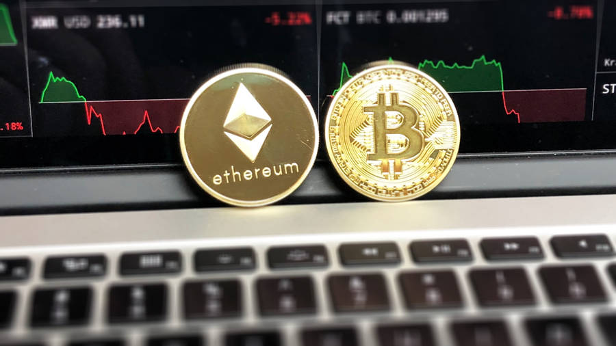 ethereum-and-bitcoin-on-laptop-0nfd7odr7qmcug7p.jpg