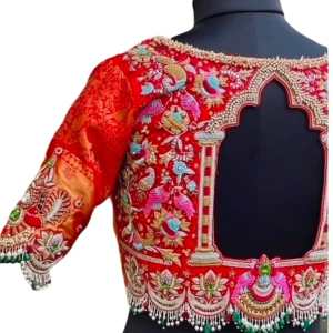 Red colour bridel wear and beautiful bird with pusa design