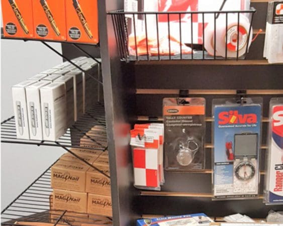 Shelf with assorted tools and accessories.