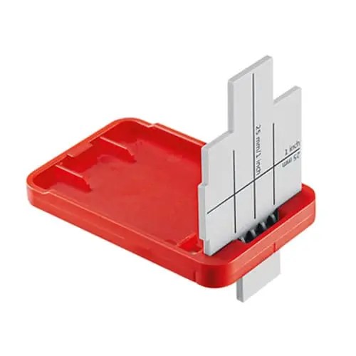 Red and gray measurement tool for thickness.