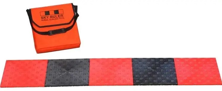 Red and black ruler with orange case.