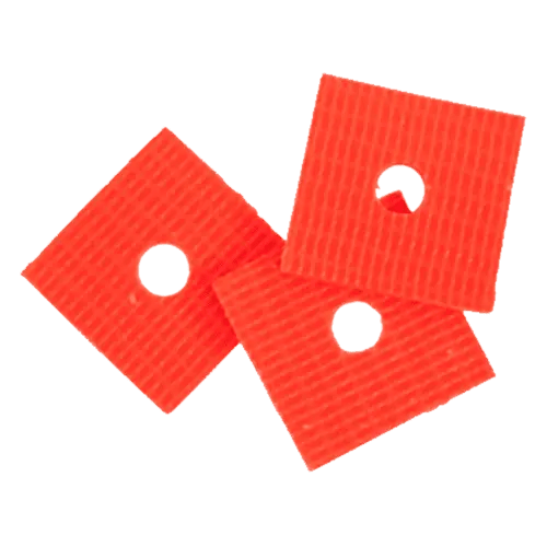 Here's an alt tag for the image: Three orange fabric squares with holes.