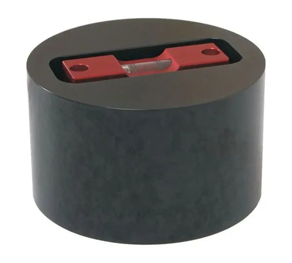 Red level tool in a black circular holder.