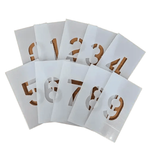 Number stencils on black background.