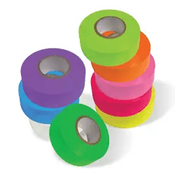 Colorful rolls of adhesive tape stacked together.