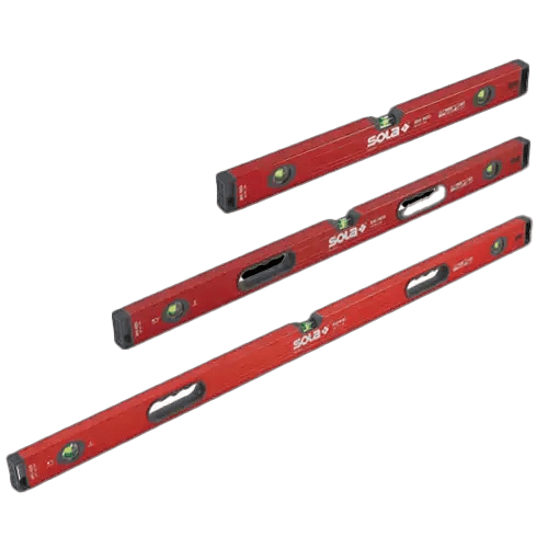 Red leveling tools on black background.