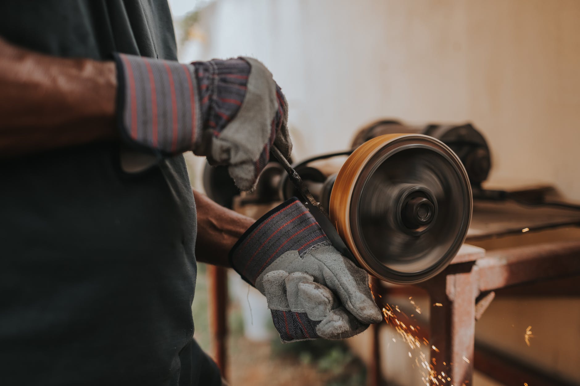 person holding black power tool