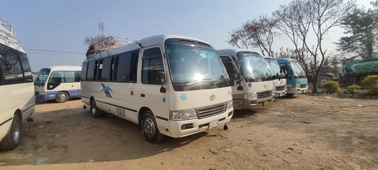 Coaster Bus for Rent in Peshawar | 4C Coaster on Daily Basis for Tours & Events - 4