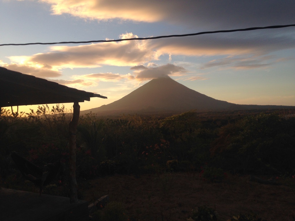 Sunset over Volcan Concepcion as admired from El Encanto Garden, one of the best options when deciding where to stay in Ometepe, Nicaragua