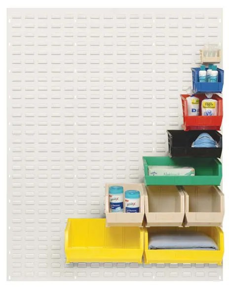 Louvered panel with bins of several sizes hung in a stepped pattern