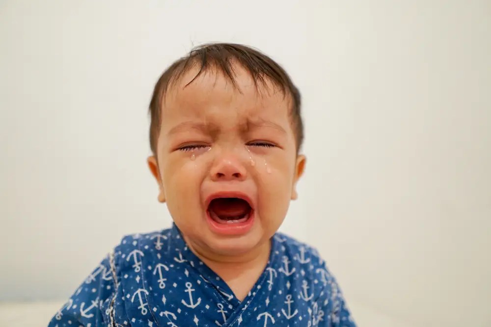 An,Asian,Looking,Little,Boy,Unhappy,Facial,Expressions,,And,Crying