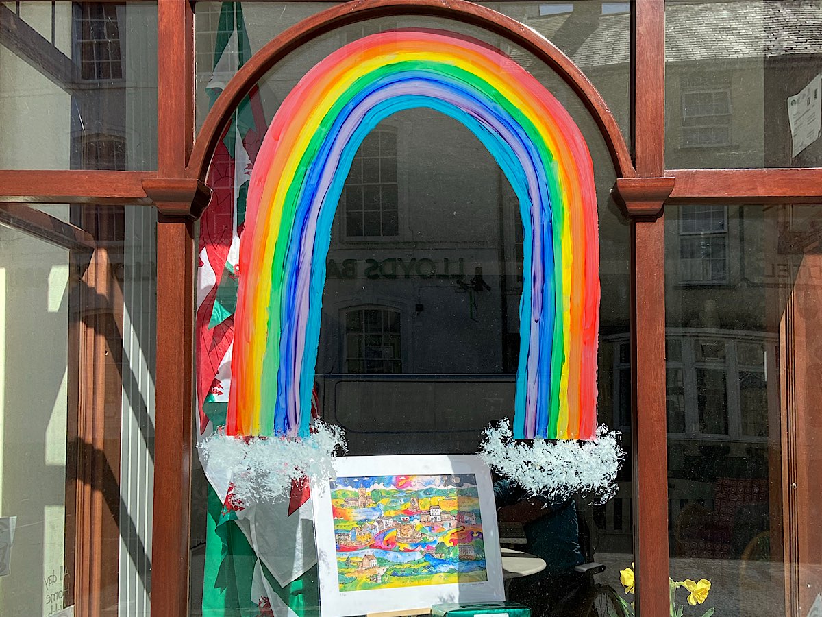 A really big rainbow in one of Lampeter's closed cafes with a beautiful picture underneath