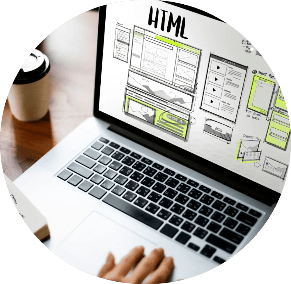 Person designing website layout in HTML.