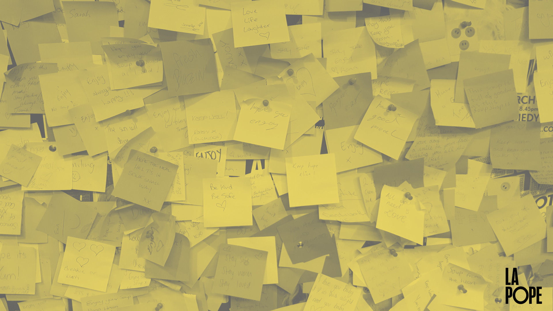 A chaotic wall of post-it notes