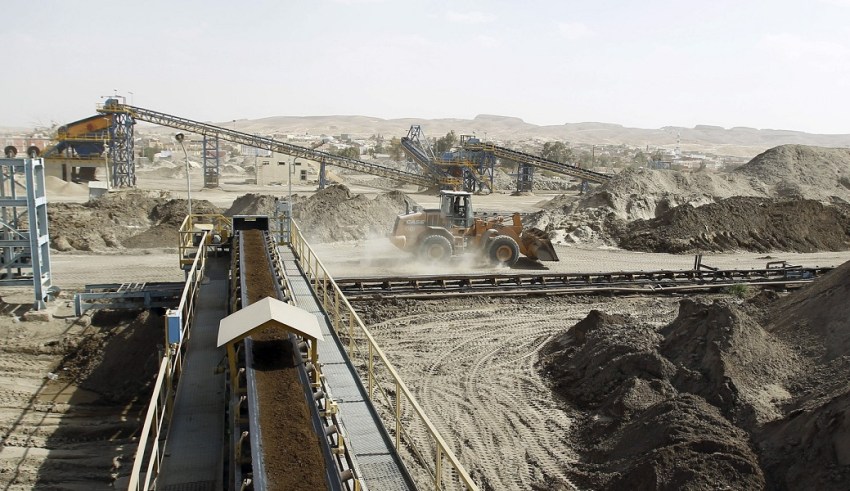 A bulldozer works at a phosphate mines in metlaoui, tunisia