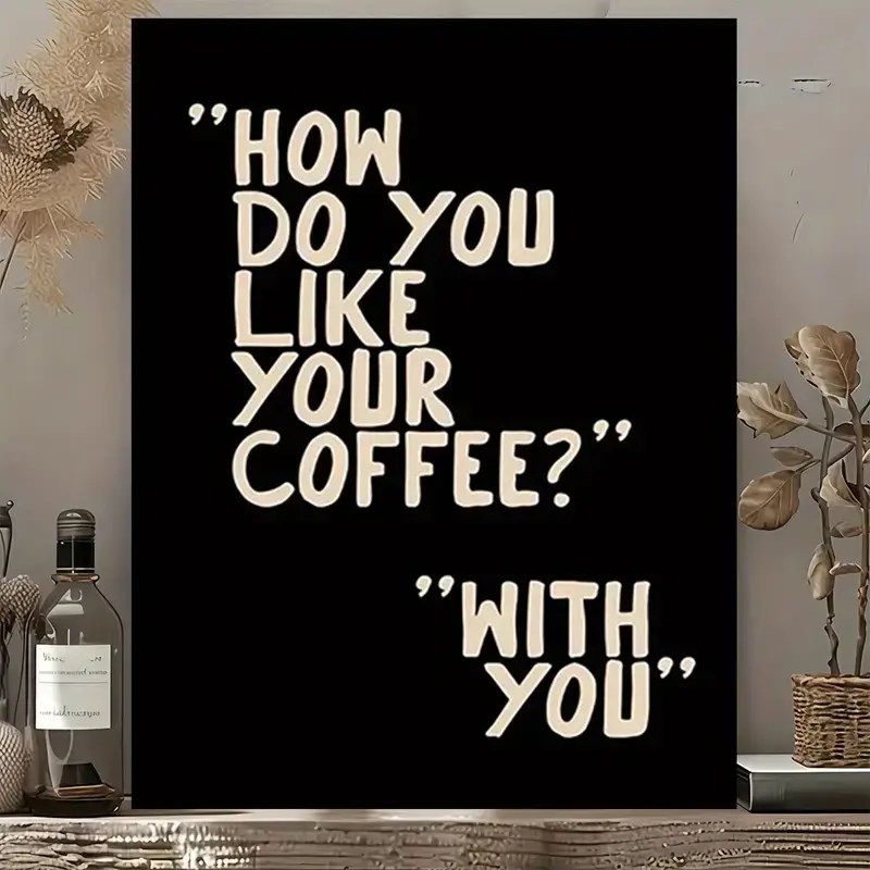 Minimalist black and cream quote print reading “How do you like your coffee? With you,” styled on a shelf with dried flowers and neutral decor.