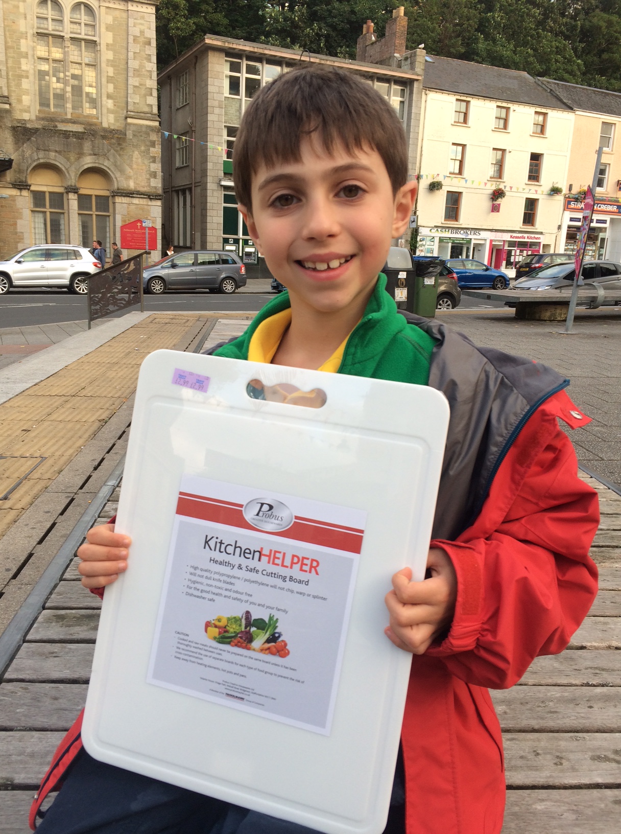 Dorian proudly displays the kitchen cutting board that will soon be our new Secchi disk.