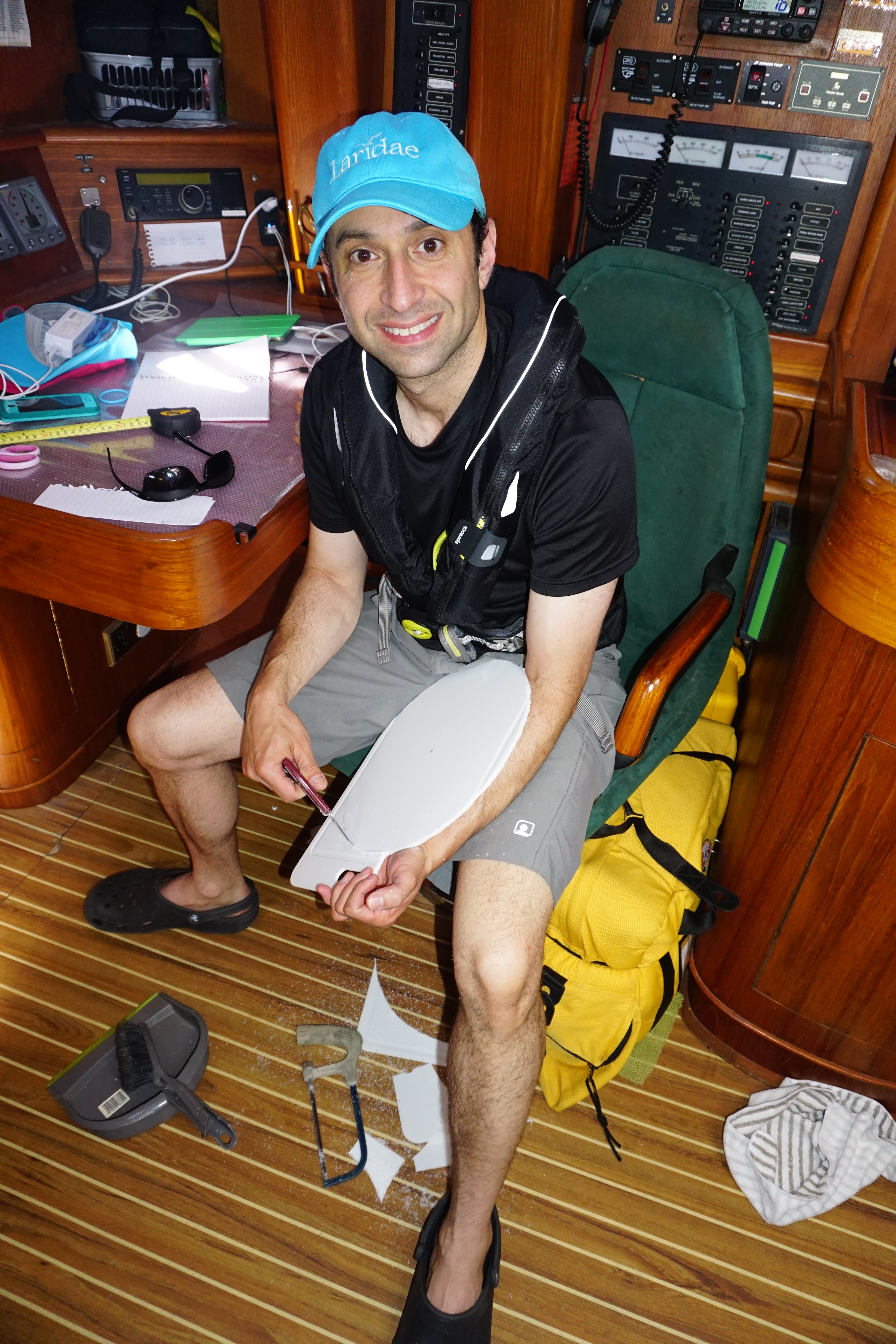 Eric takes his turn cutting the circular disk from the board.